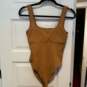 Beige ribbed body suit
